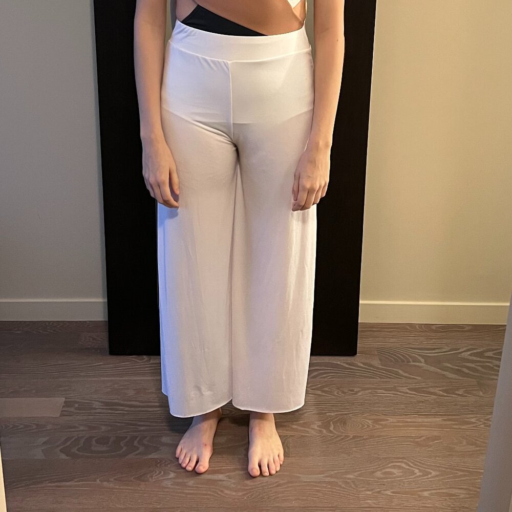 White lyrical/contemporary pants plus white briefs